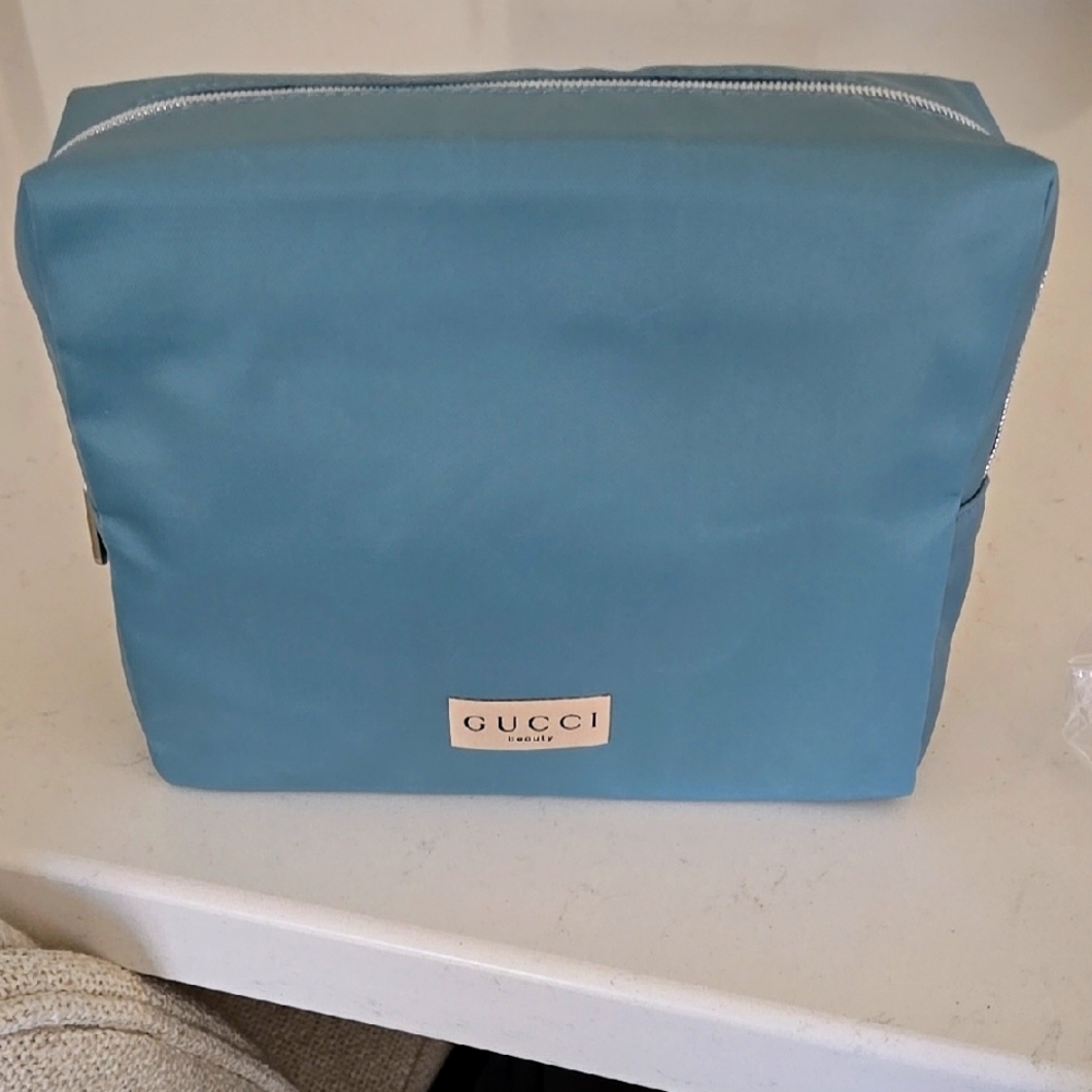 New never used GUCCI pouch clutch bag  8 x 6  1/2 beautiful blue, silver Zipper